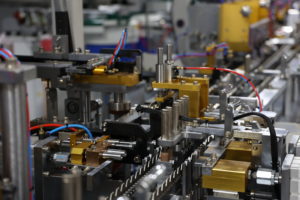 Close up of a factory machines with a bunch of wires
